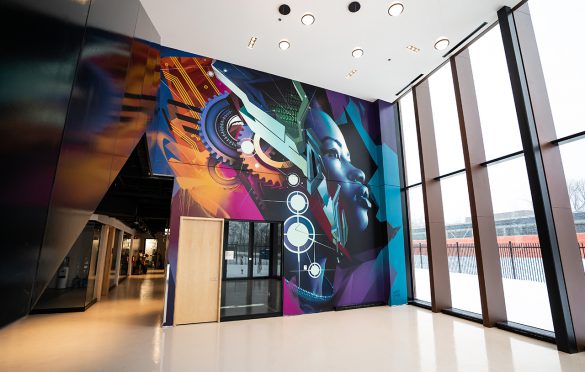 Gazing into a connected future – muralist Zek One brings a hopeful vision of tomorrow to QC22.